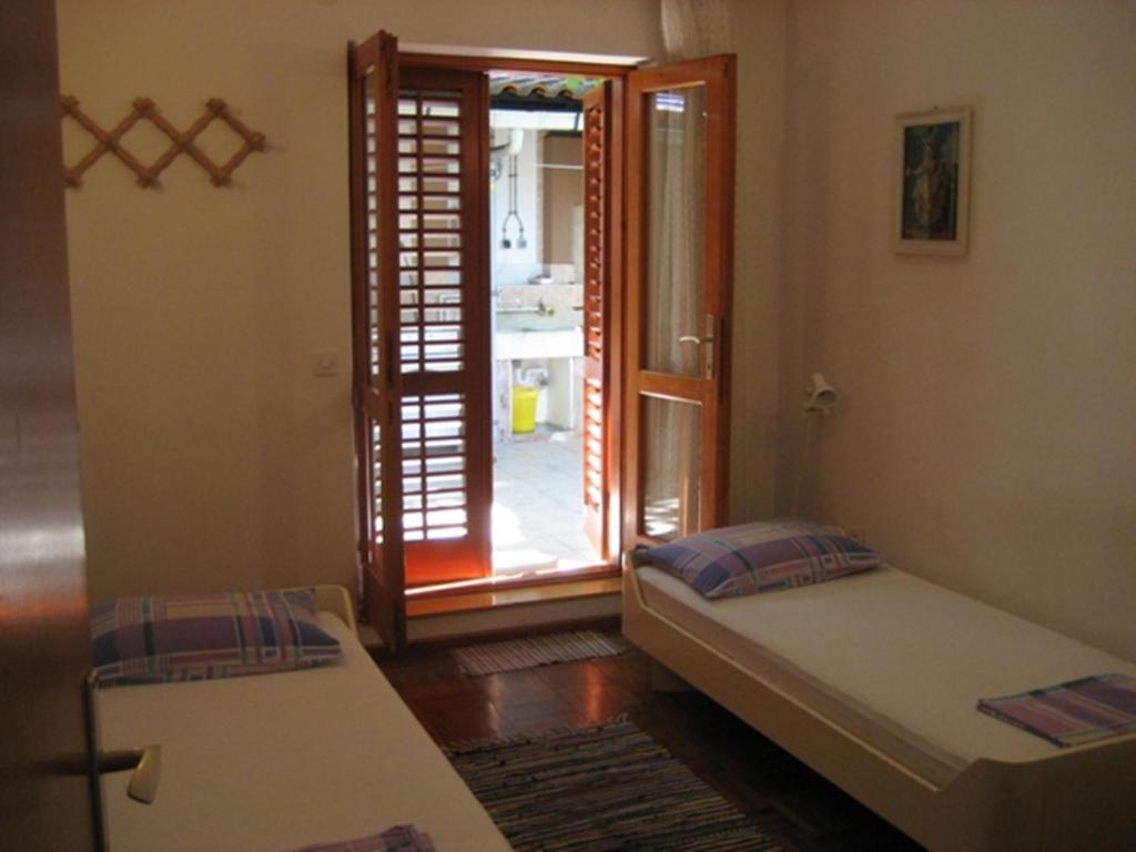 Guest House Kuzmanic Hvar Island Quarto foto